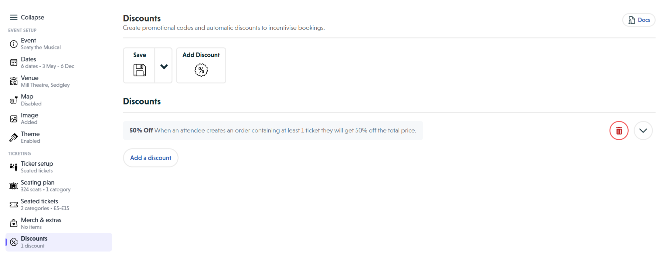 The Discounts editor showing the toolbar with Save and Add Discount buttons, an existing 50% Off discount with its summary text, and the Add a discount button